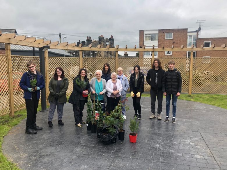  Students volunteering with Otley in Bloom and Care Home residents