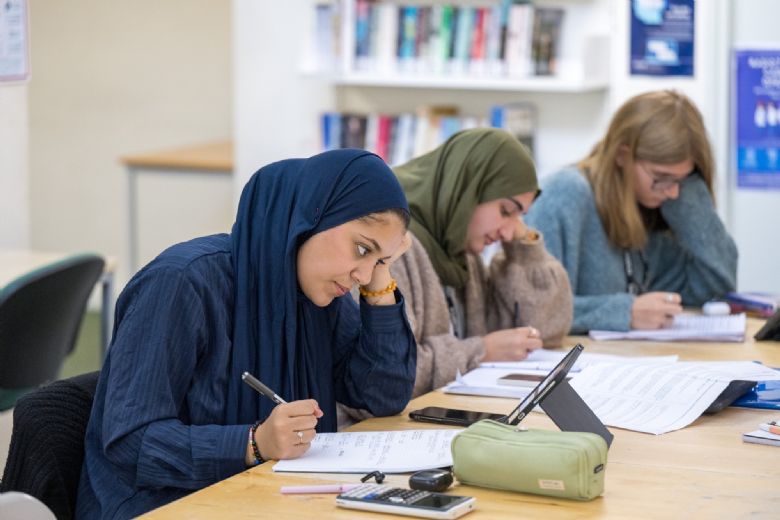 Students working in the Library