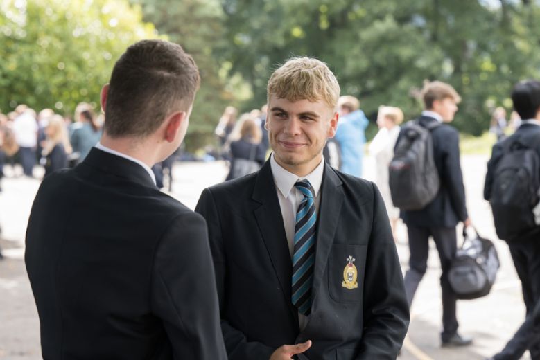 Student smiling with friend