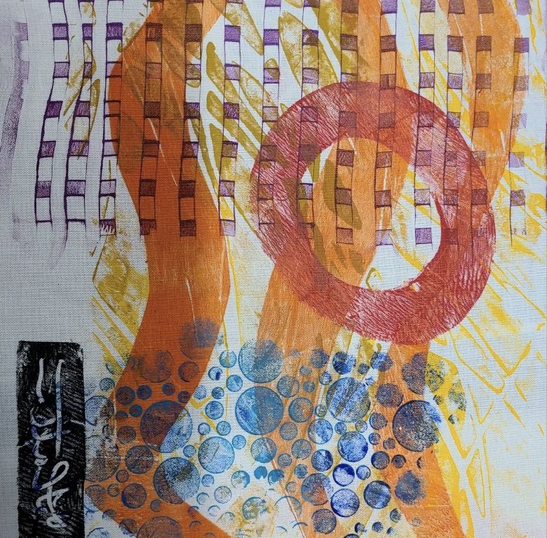 Gold and orange print with wavy lines